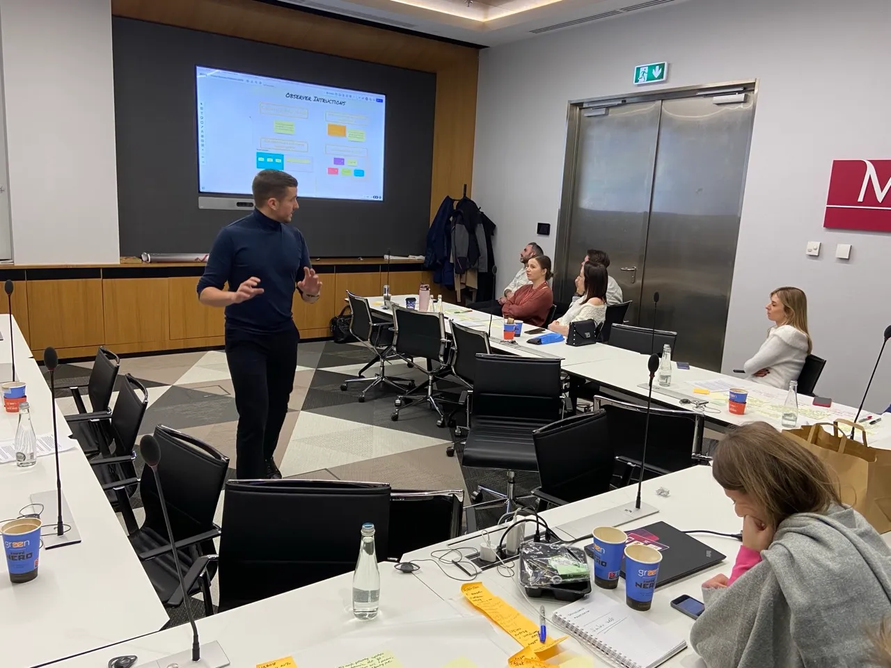 Olek leading a discovery workshop with a team at Millennium Bank